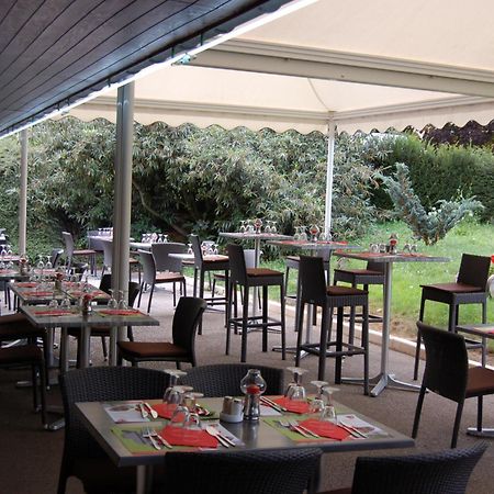 Logis Hotel Lons-Le-Saunier - Restaurant Le Grill المطعم الصورة